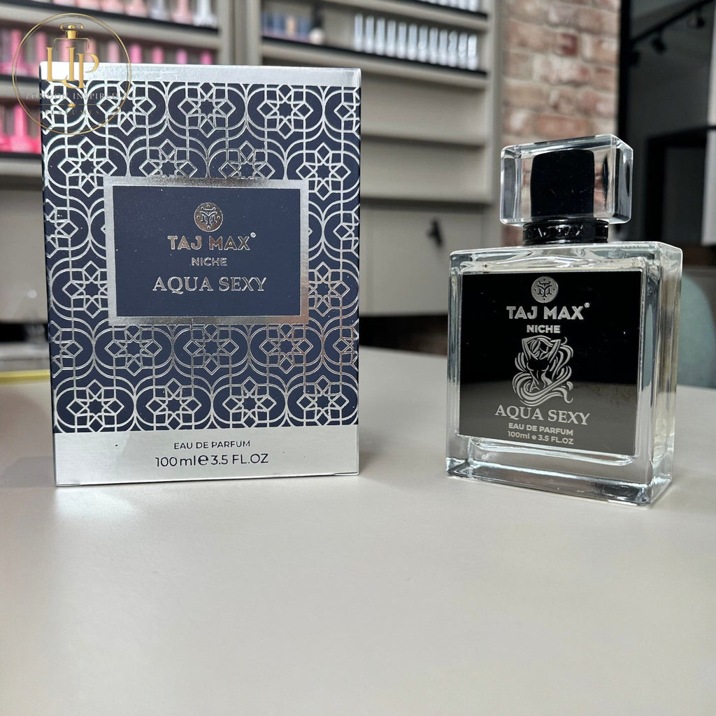 Taj Max Aqua Sexy perfume bottle and packaging on a table
