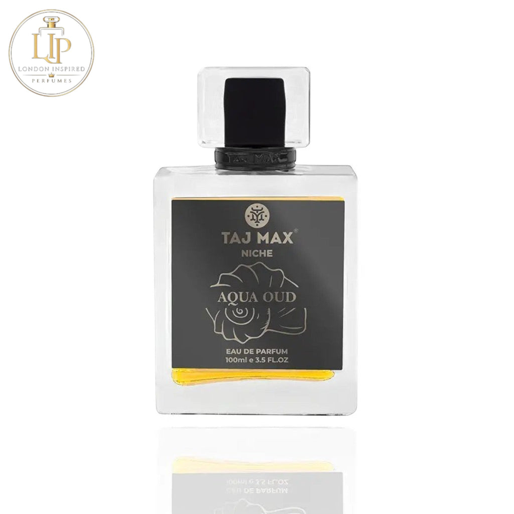 Perfume bottle labeled 'Taj Max Niche Aqua Oud' on a white background