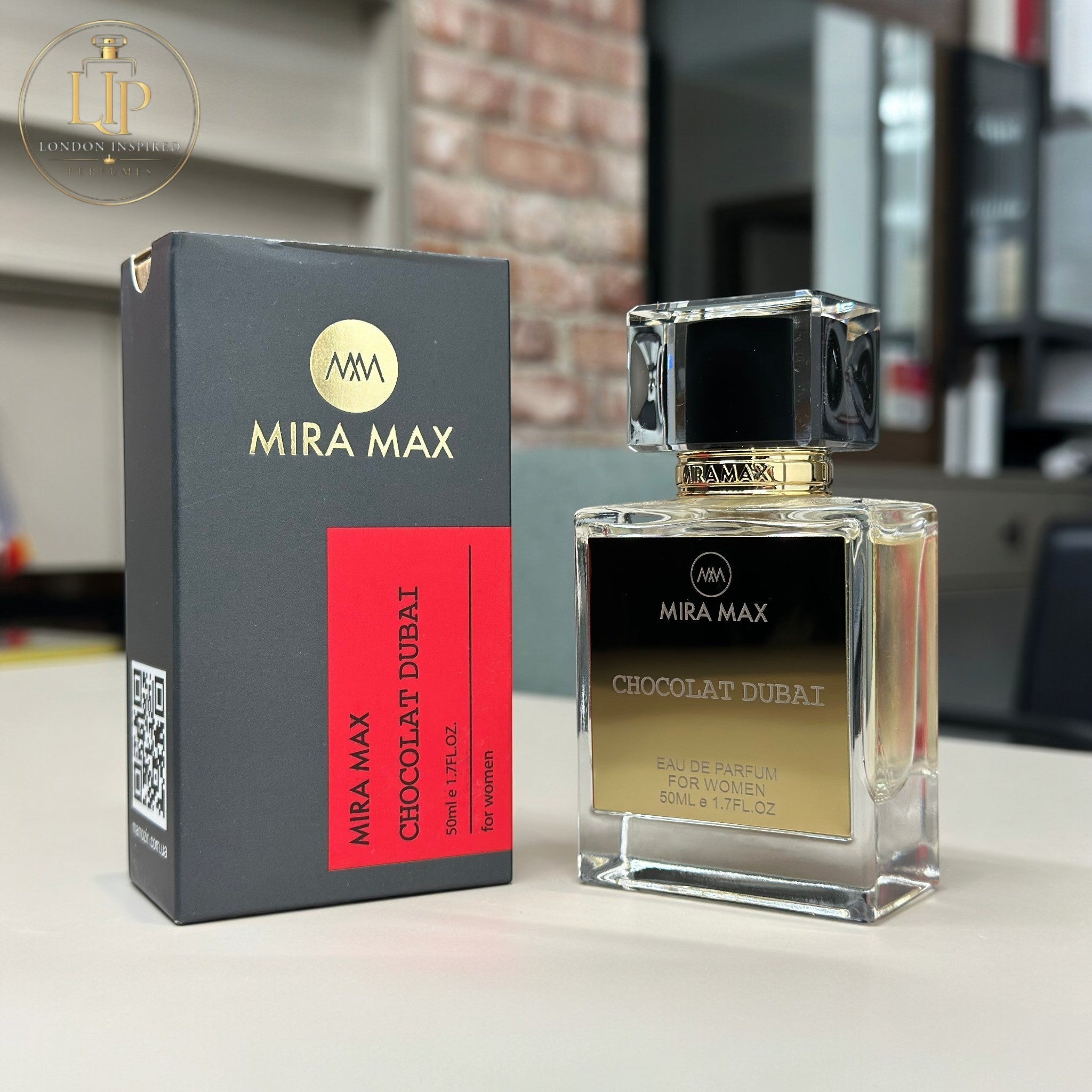 Mira Max Chocolat Dubai perfume bottle and packaging on a table.