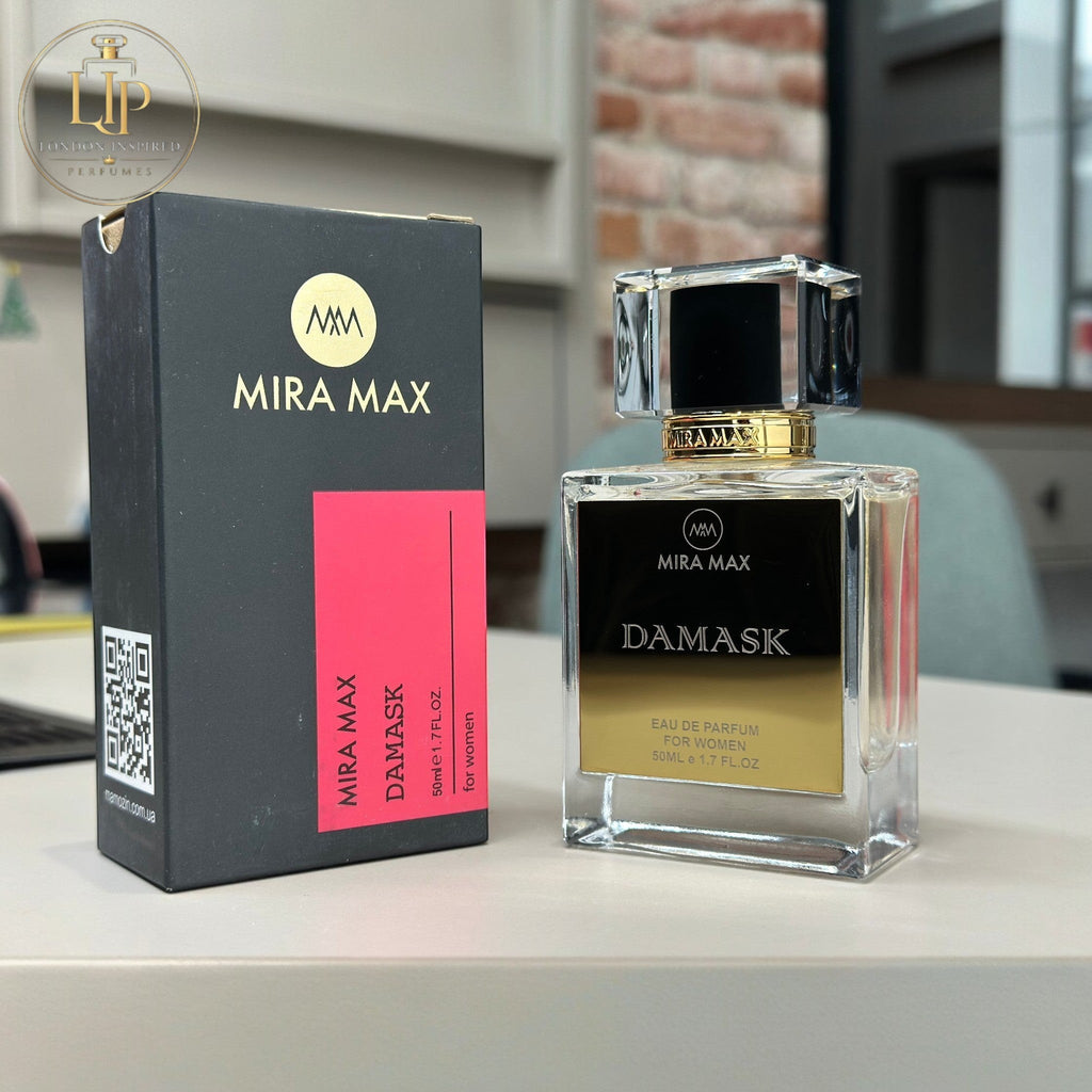 MIRA MAX Damask perfume bottle and packaging on a table.