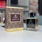 Taj Max Desert Rose perfume bottle and packaging on a table