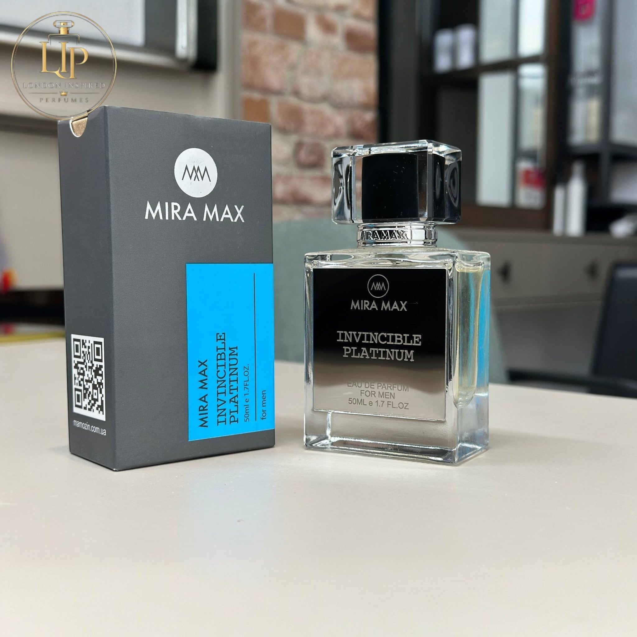 Mira Max Invincible Platinum perfume bottle and packaging on a table.