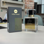 MIRA MAX Kirka perfume bottle and packaging on a table with a blurred indoor background