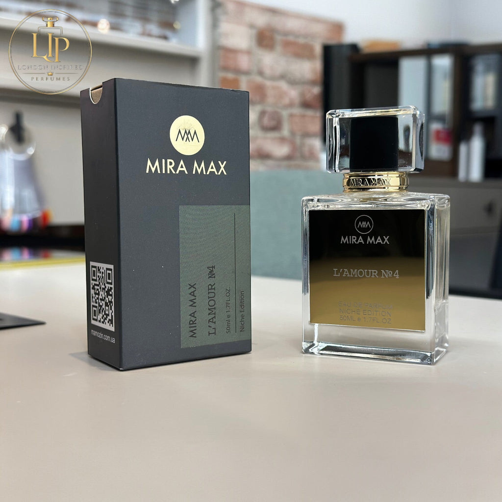 MIRA MAX perfume bottle and packaging on a surface with a blurred background
