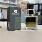 MIRA MAX perfume bottle and packaging on a surface with a blurred background