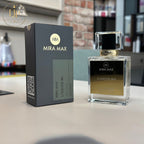 MIRA MAX perfume bottle and packaging on a surface with a blurred background