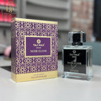 Taj Max Noir Elixir perfume bottle and packaging on a table