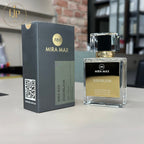 MIRA MAX perfume bottle and packaging on a surface with a blurred background