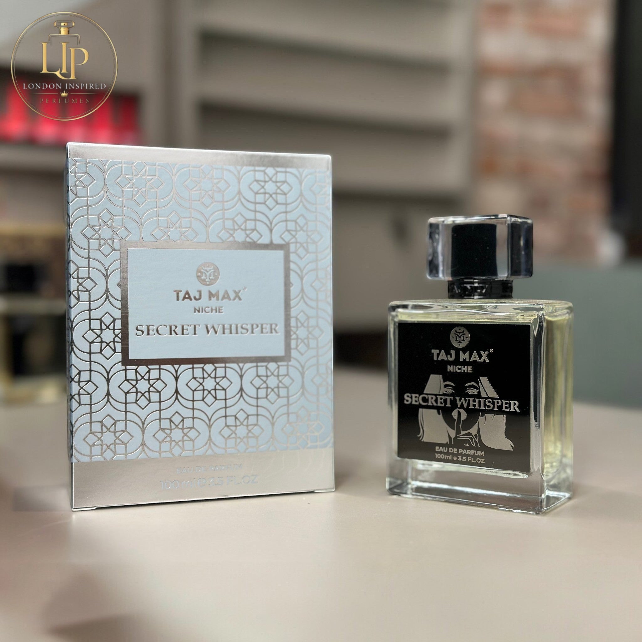Taj Max Secret Whisper perfume bottle and packaging on a table