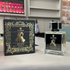 Tajmax Sexy Oud perfume bottle and packaging on a table
