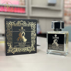 Tajmax Sexy Oud perfume bottle and packaging on a table