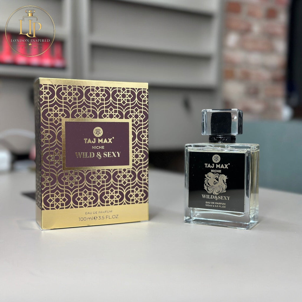Taj Max Wild & Sexy perfume bottle and packaging on a table.